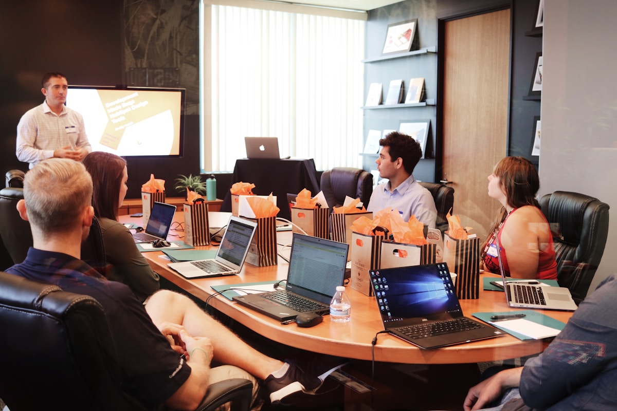 Strategists planning growth initiatives on a whiteboard