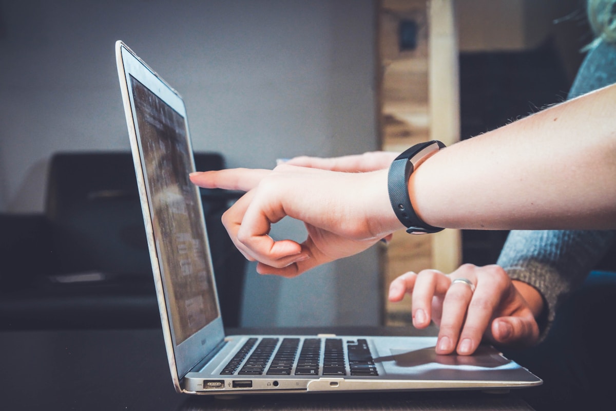 Paid search specialist reviewing keyword performance and ad copy